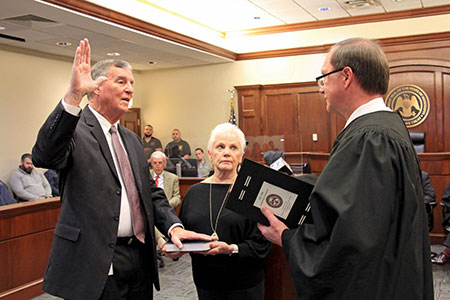 Judge Kent McDaniel takes oath