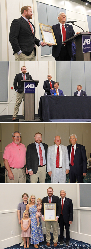 Image of MEC- Director Nathan Evans receiving award